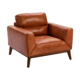 Kortárs stílusú, dohánybarna bőrrel kárpitozott, dizájn fotel diófa lábakkal.