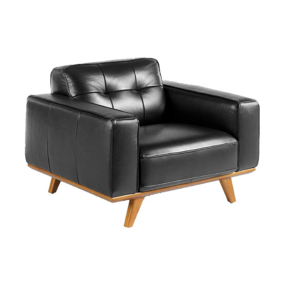 Kortárs stílusú, fekete bőrrel kárpitozott, dizájn fotel diófa lábakkal.