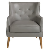 Kortárs stílusú, hamuszürke bőrrel kárpitozott, dizájn fotel, kőrisfa lábakkal