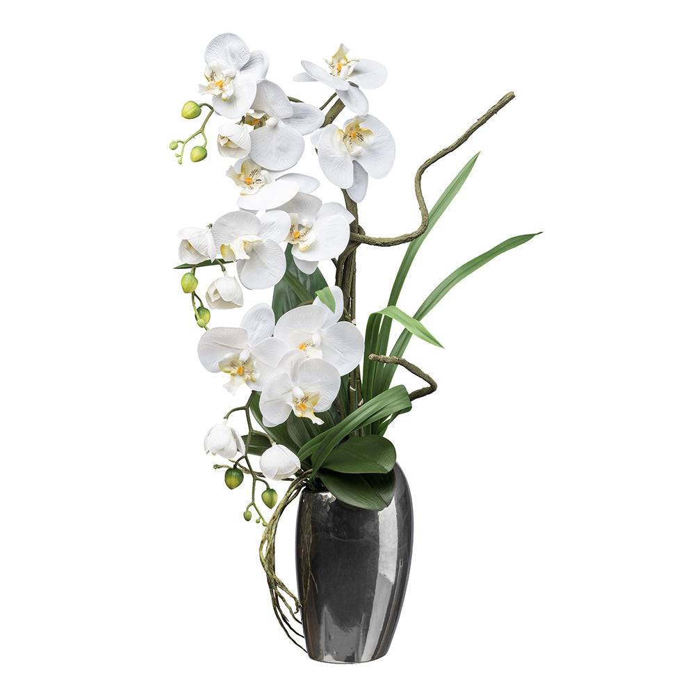 Fehér mű orchidea kompozíció ezüstszürke kaspóban, 68 cm magas.