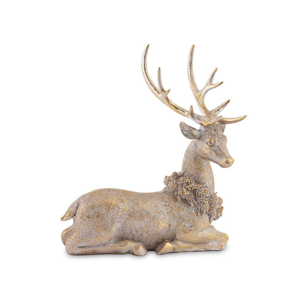 Aranyszínű, karácsonyi szarvas figura.