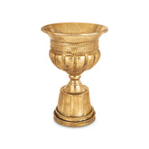 Antique Metals antik aranyszínű fém kaspó 42 cm magassággal, klasszikus talapzattal és díszített urnás formával, beltéri dekorációhoz.