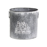 Ünnepi dombormintával díszített, karácsonyi bádogkaspó.