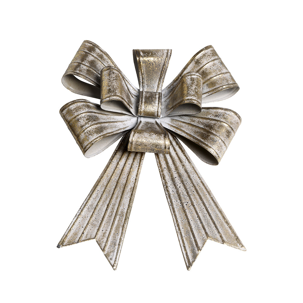 Rézszínű, fémből készült karácsonyi dekor masni.