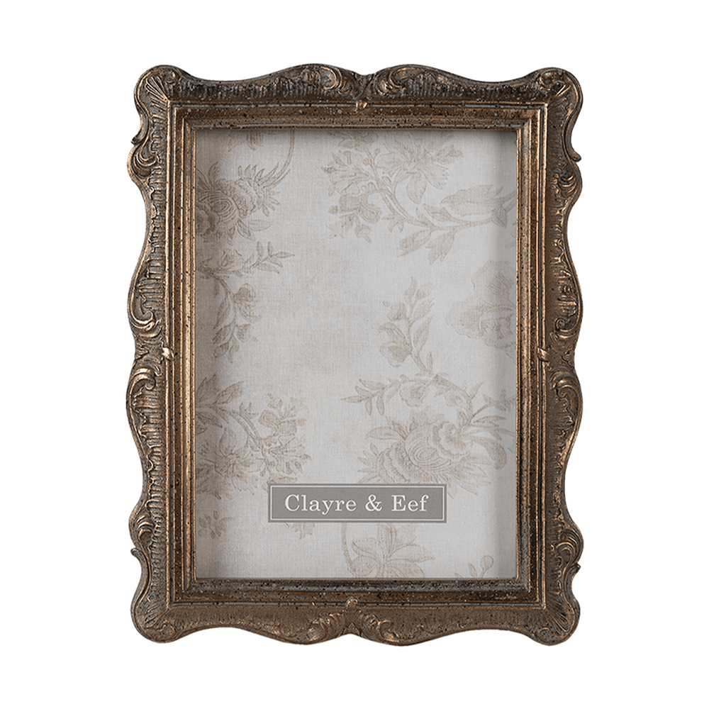 Aranyszínű asztali fényképtartó.