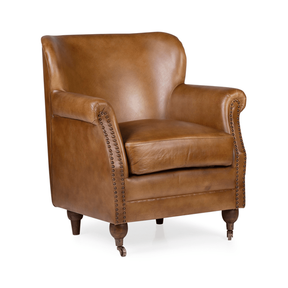 Konyakszínű marhabőrrel kárpitozott, szárnyas bőrfotel.