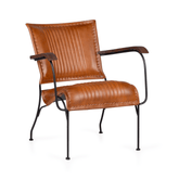 Konyakszínű marhabőrrel kárpitozott, formatervezett karosszék.