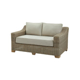 2 személyes, bézs színű műrattan kerti kanapé.