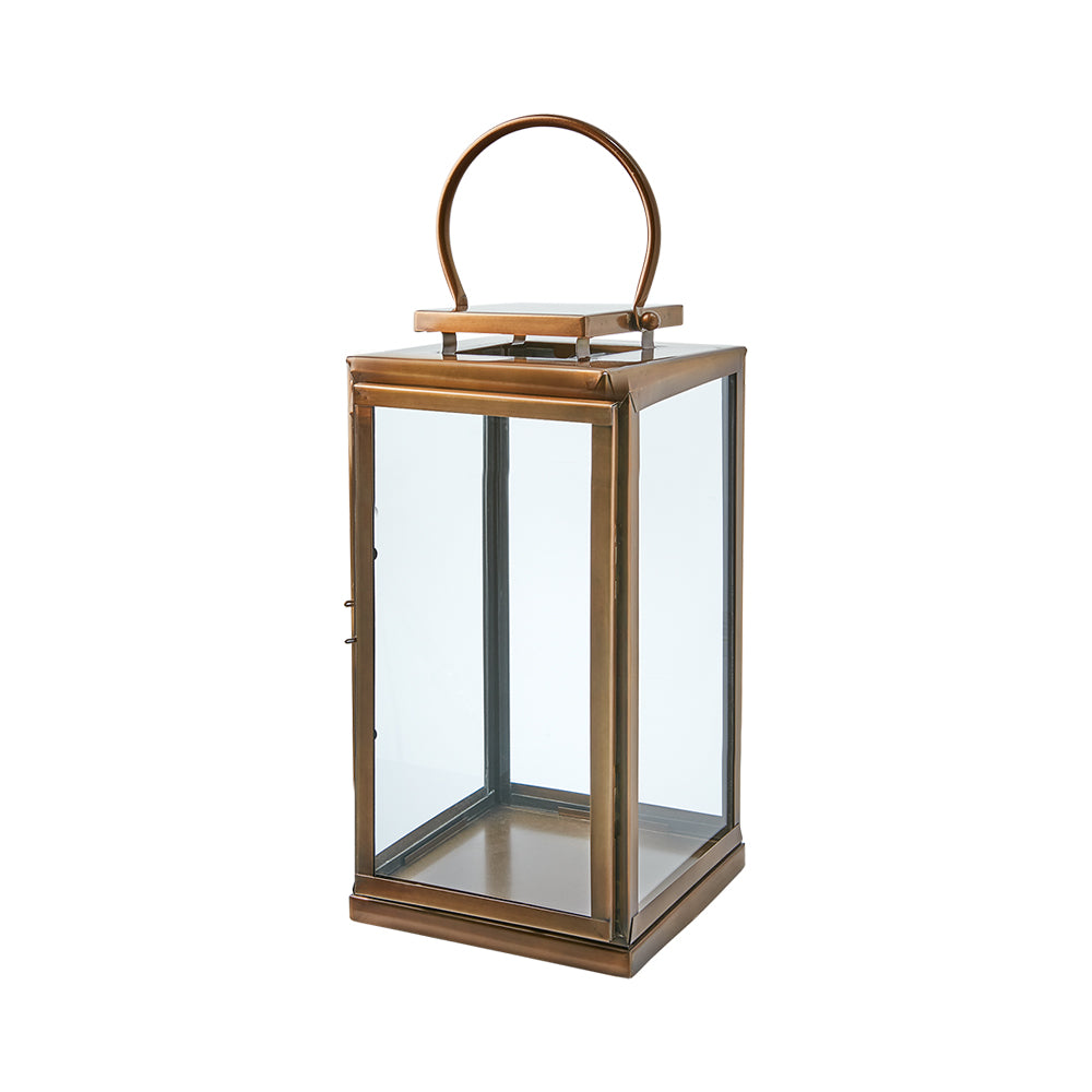 Modern, kortárs stílusú, rozsdamenetes acélból készült, sárgarézszínű lámpás.