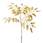 Aranyszínű, mű eukaliptusz ág.