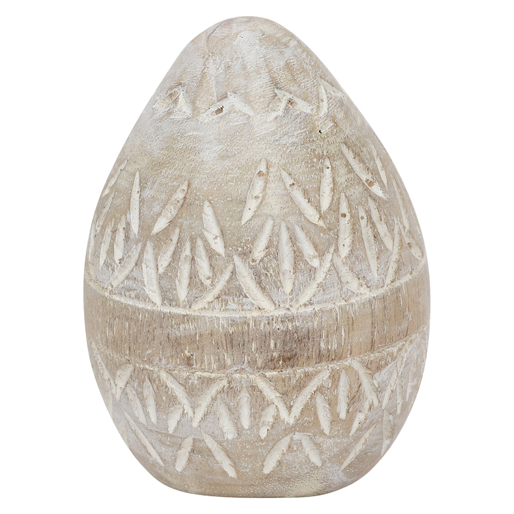 Mangófából faragott, húsvéti dekor tojás.