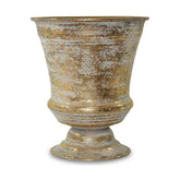 Óarany színű fém kaspó.