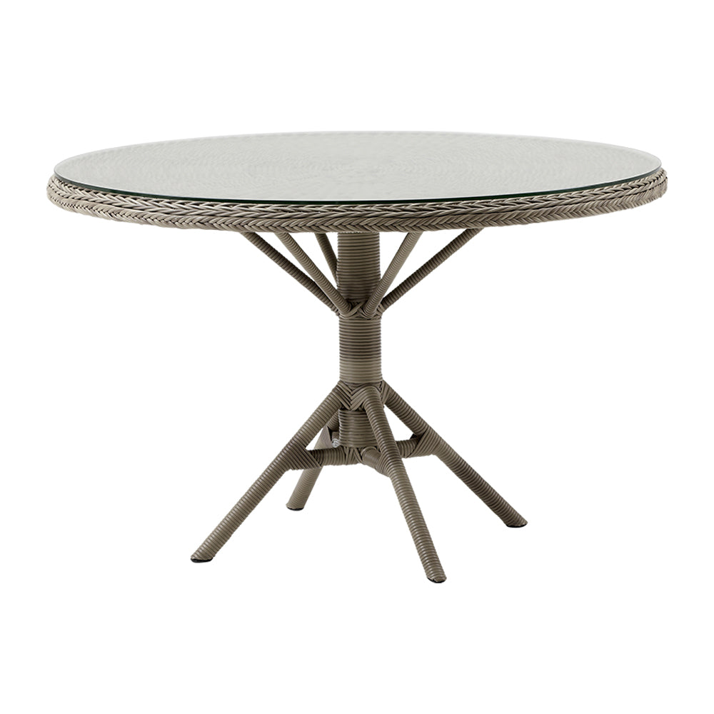 Üveglappal fedett, antikszürke színű, műrattan kerti asztal.