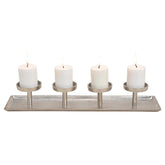 Ezüstszínű, adventi gyertyatartó.