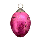 Függeszthető kialalkítású, pink színű, nagy húsvéti üvegtojás.