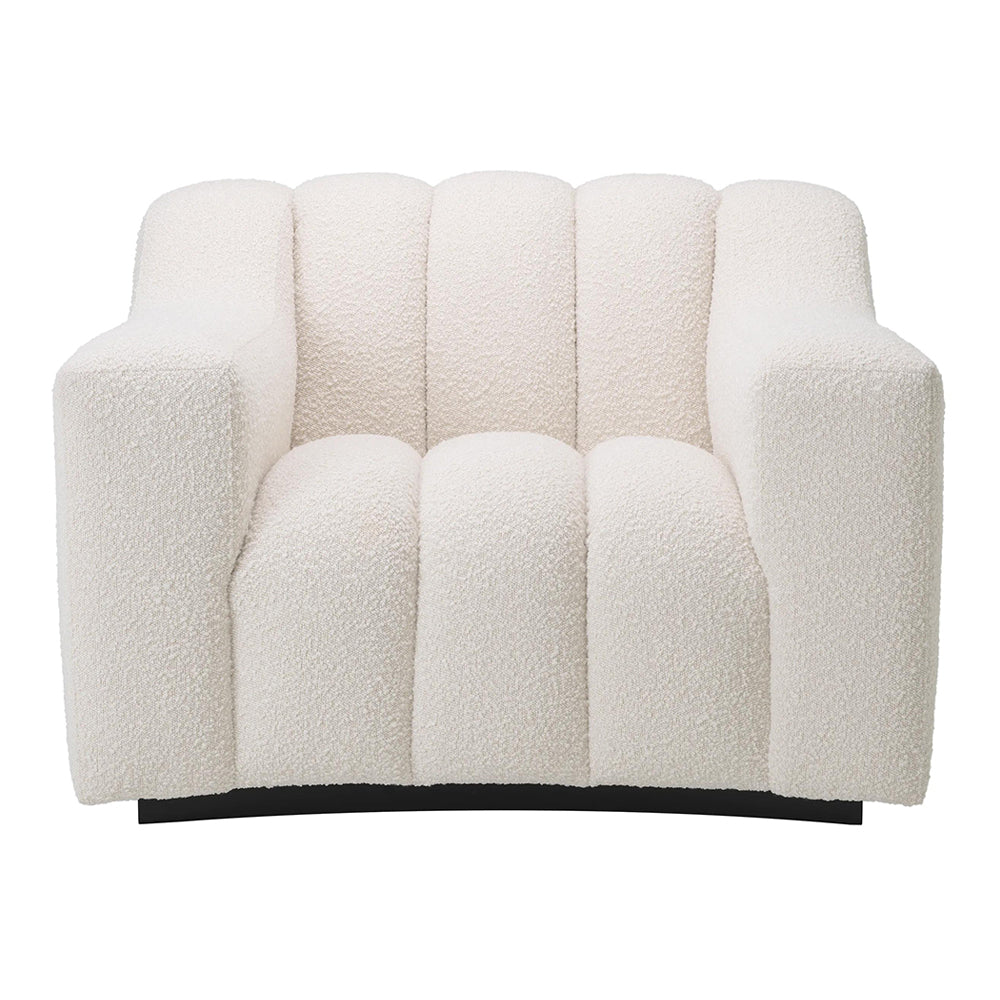 Krémszínű buklé szövettel kárpitozott dizájn fotel .