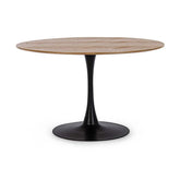 Kerek formájú, modern megjelenésű étkezőasztal.