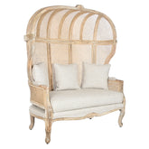 Koloniál stílusú, antikolt faragott mangófából készült, natúr színű, rattan betétes hintó szófa.