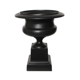 Fémből készült,, fekete színű óriás kaspó-váza.