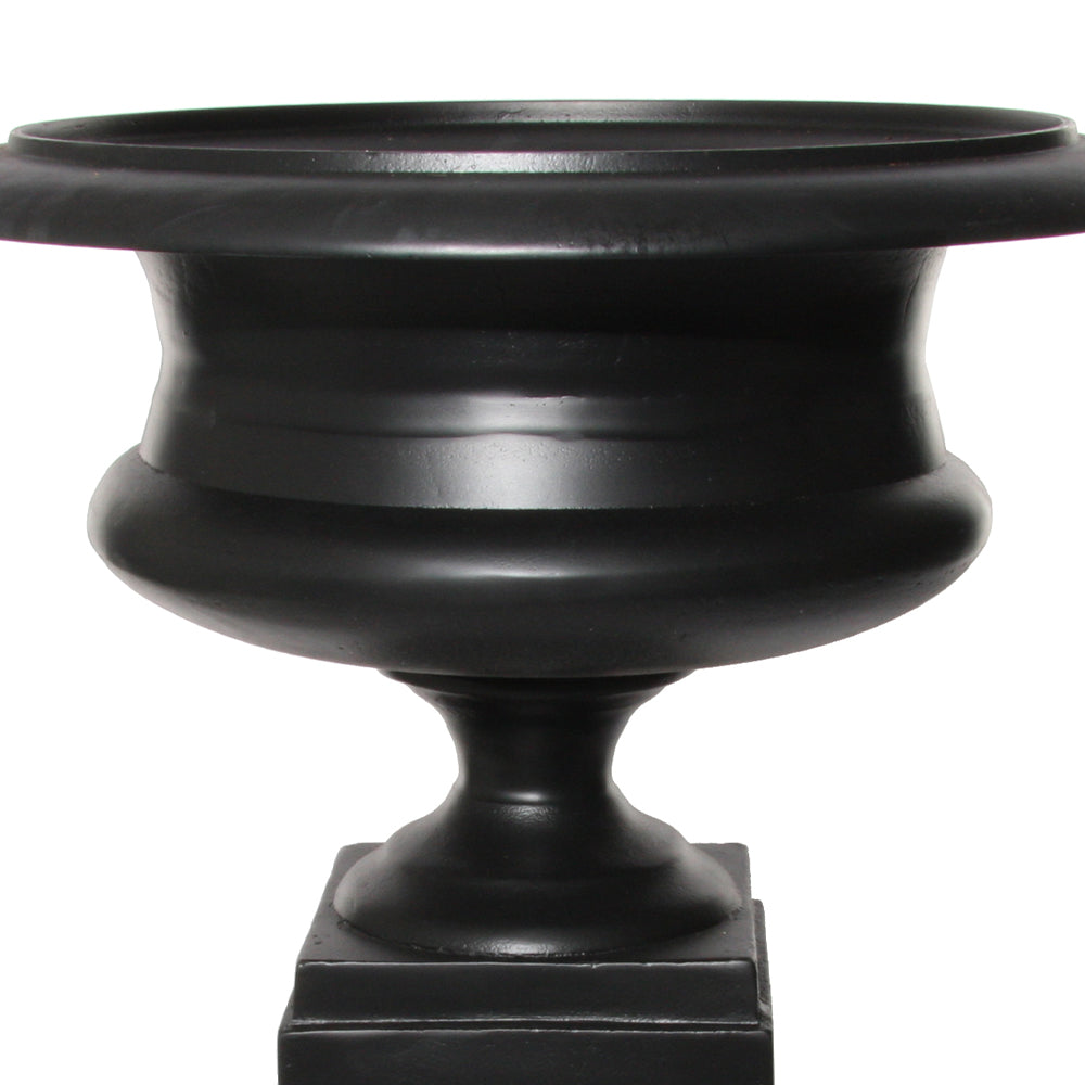 Fémből készült,, fekete színű óriás kaspó-váza.
