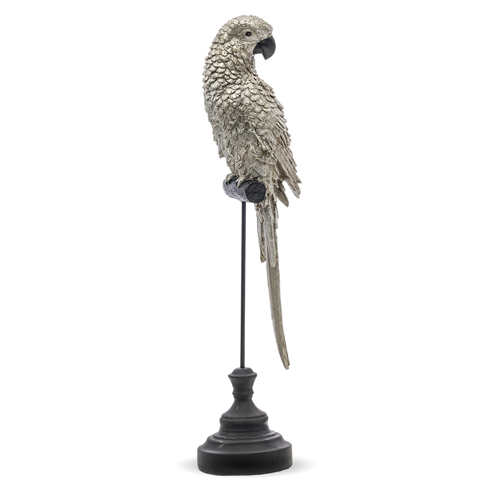 Ezüstszínű, dekoratív papagáj figura.