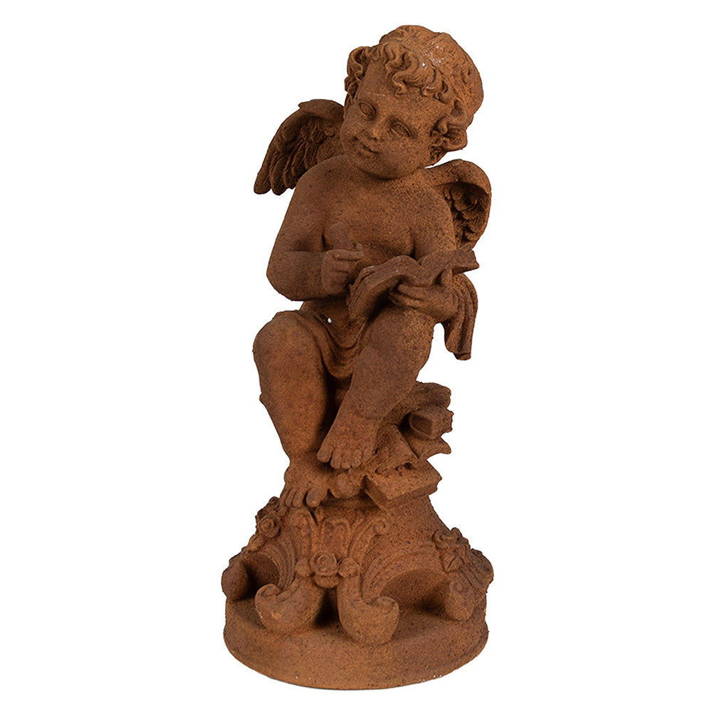 Rozsdabarna színű, antikolt felületű angyal figura.