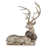 Pezsgőszínű karácsonyi szarvas figura.