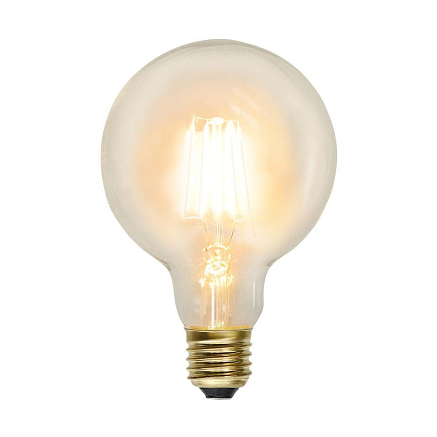 Clear Filament dekorációs izzó. Meleg fehér fényű LED dekorációs izzó áttetsző üveggel.
