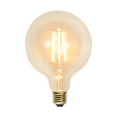 Clear Filament dekorációs izzó. Meleg fehér fényű LED dekorációs izzó áttetsző üveggel.