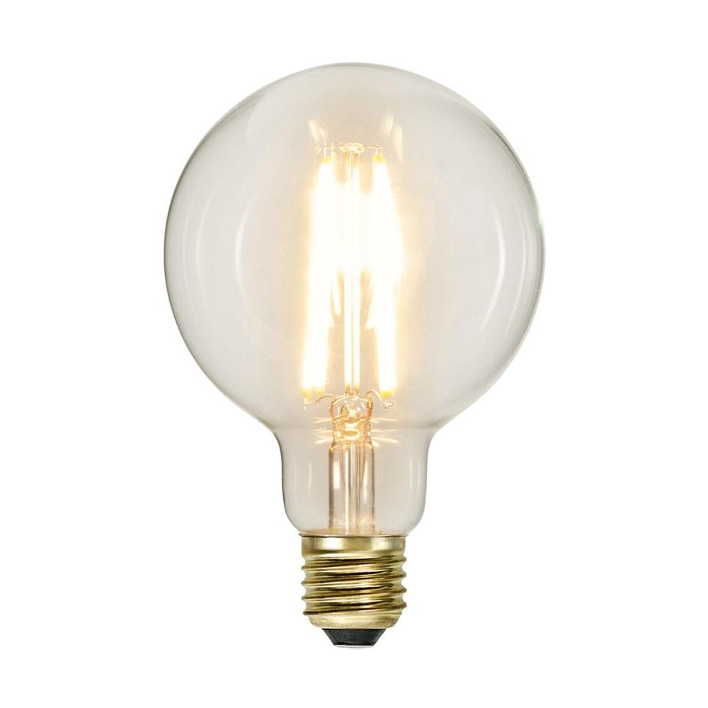 Clear Filament dekorációs izzó. Meleg fehér fényű LED dekorációs izzó áttetsző üveggel.