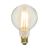 Clear Filament dekorációs izzó. Meleg fehér fényű LED dekorációs izzó áttetsző üveggel.