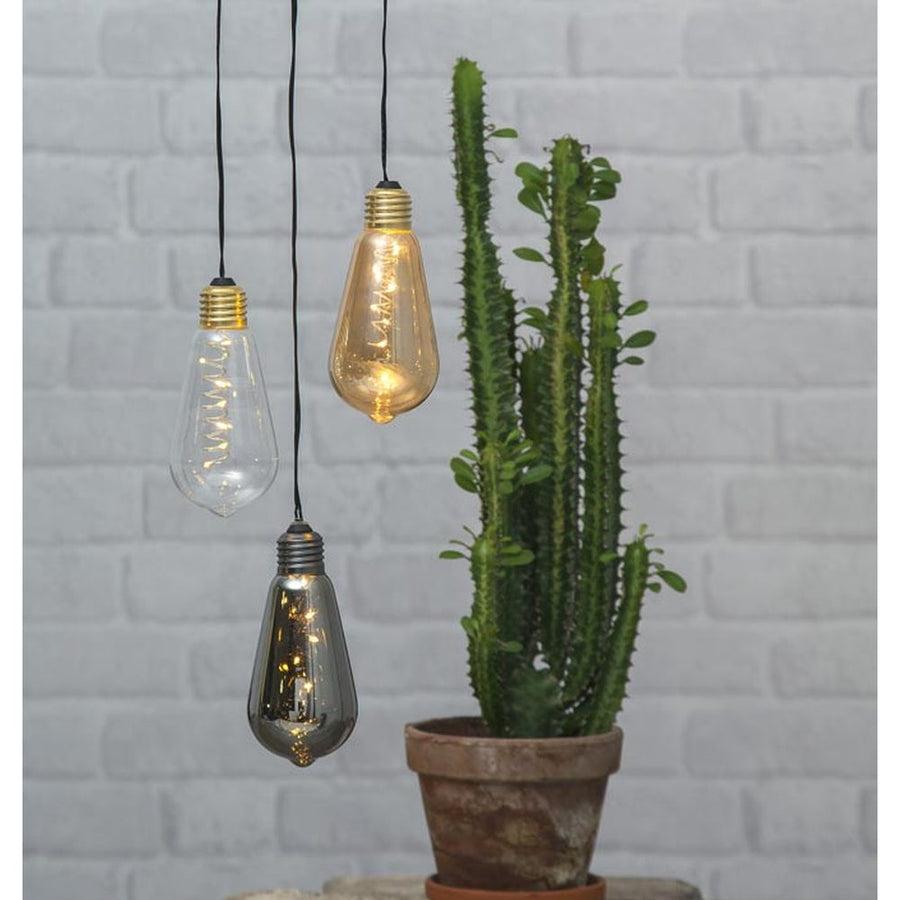 Indoor hanging decorative LED bulbs on a 156 cm cord with smoky glass shades and vintage filament look.