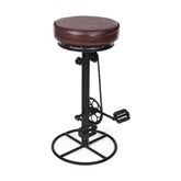 Ipari stílusú, fekete színű, fémből készült pedálos bárszék bőr ülőfelülettel.