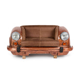 Bronz színű autófront kanapé, bőr üléssel és működő autólámpákkal.