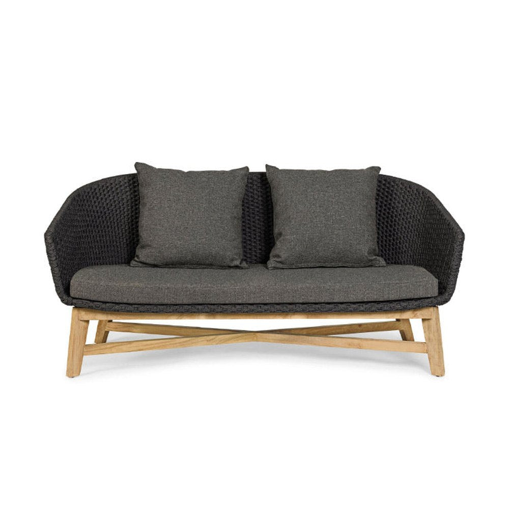 Prémium kategóriás, design kerti kanapé sötétszürke színű párnákkal.