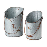 Kétdarabos, vidéki stílusú, szürke színű bádogkaspó szett.