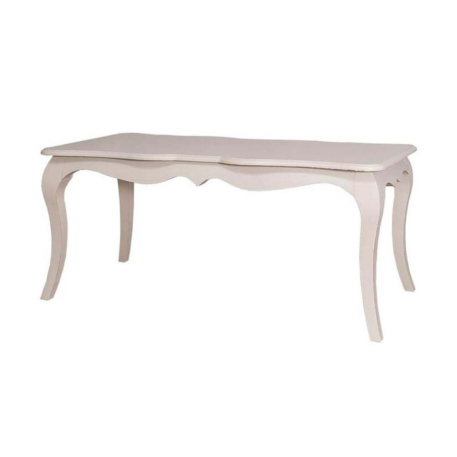 Whitewashed pine dining table with elegantly curved cabriole legs in shabby chic style