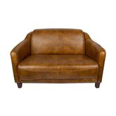 Vintage stílusú, valódi bőrből készült kanapé fa lábakkal.