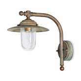 Country stílusú, antikolt réz színű falikar tányérszerű lámpatesttel és átlátszó üvegbúrával.