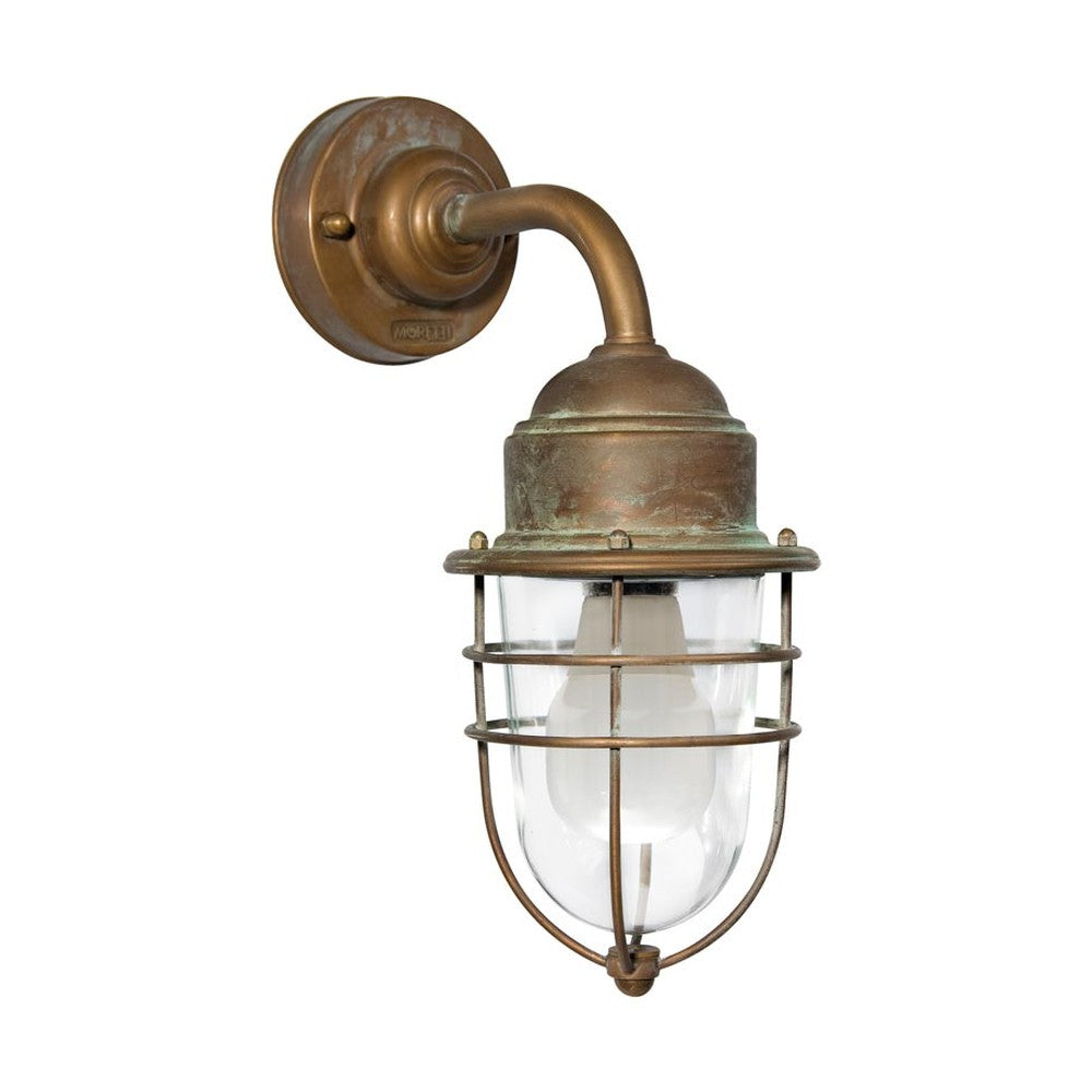 Industrial stílusú, antikolt sárgaréz színű, réz falikar átlátszó üvegbúrával.