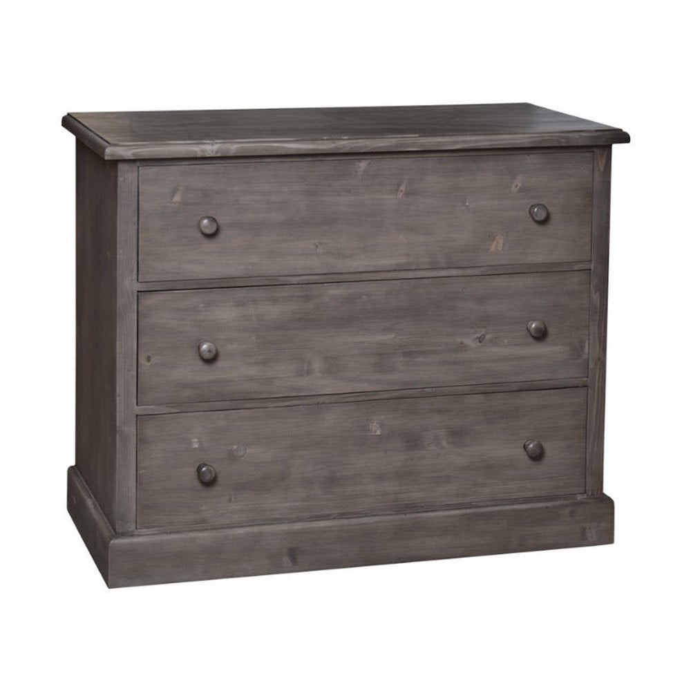 Fenyőfából készült, csiszolt, szürke színű három fiókos komód.