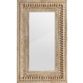 Keleti stílusú, dekoratív faragásokkal díszített falitükör mangófakerettel.