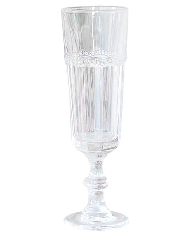 Vintage stílusú, pontozott dombormintával díszített átlátszó üvegű pezsgőspohár.