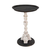 Antikolt felületű, fémből és műgyantából készült, fekete és krém színű lerakó kisasztal.