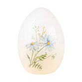 Mezei virágokkal díszíttetett húsvéti kerámia tojás.