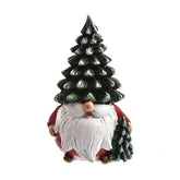 Skandináv stílusú, mókás megjelenésű, karácsonyi manó figura fenyősapkában.