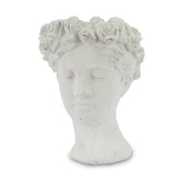 Antikolt felületű, krém színű kaspó büszt.