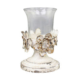 Shaby Chic, vintage stílusú kopottan sikkes megjelenésű, antikolt krém színű fém virágokkal díszített üvegkelyhes gyertyatartó