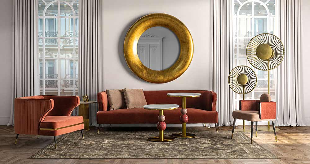 A Loft&Vintage webshop art deco stílusú kollekciójának borítóképe elegáns szobarészlet modern art deco geometrikus bútorokkal, óriási kerek arany tükörrel.