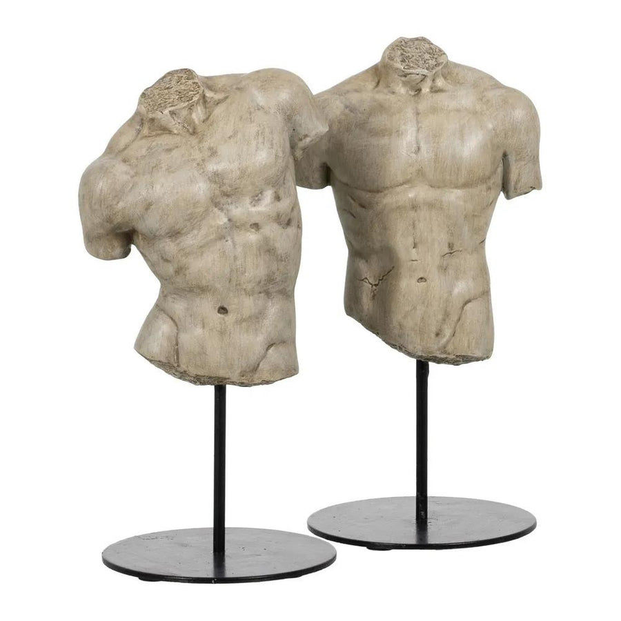 Mészkőhatású, krémszínű, 2 darabos szobor töredék, fekete fém talapzaton..